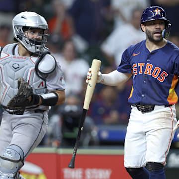 Sep 8, 2024; Houston, Texas, USA; Houston Astros second baseman Jose Altuve (27) reacts after striking out during the eighth inning against the Arizona Diamondbacks at Minute Maid Park.