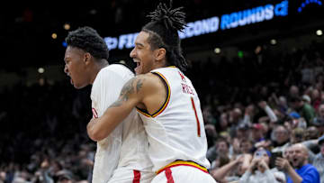 Maryland Terrapins center Derik Queen celebrates with teammates after scoring the game-winning shot against the Colorado State Rams at Climate Pledge Arena. 