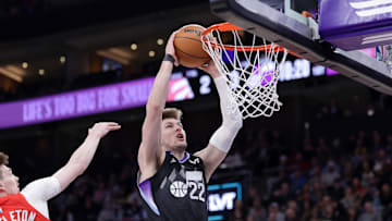 Mar 14, 2025; Salt Lake City, Utah, USA;  Utah Jazz forward Kyle Filipowski (22) attempts to dunk the ball during the first quarter against the Toronto Raptors at Delta Center. Mandatory Credit: Chris Nicoll-Imagn Images