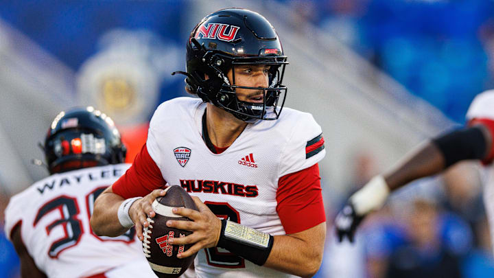 Sep 24, 2022; Lexington, Kentucky, USA; Northern Illinois Huskies quarterback Ethan Hampton (2) looks for a receiver during the first quarter against the Kentucky Wildcats at Kroger Field. Mandatory Credit: Jordan Prather-Imagn Images