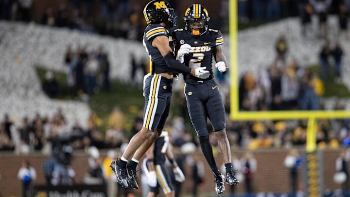 Nov 11, 2023; Columbia, Missouri, USA; Missouri Tigers players celebrate after a missed field goal by Tennessee at the end of the game at Faurot Field at Memorial Stadium. Mandatory Credit: Kylie Graham-Imagn Images