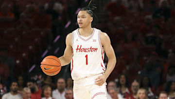 Nov 12, 2025; Houston, Texas, USA; Houston Cougars guard Isiah Harwell (1) dribbles the ball during the first half against the Oakland Golden Grizzlies at Fertitta Center. Mandatory Credit: Troy Taormina-Imagn Images