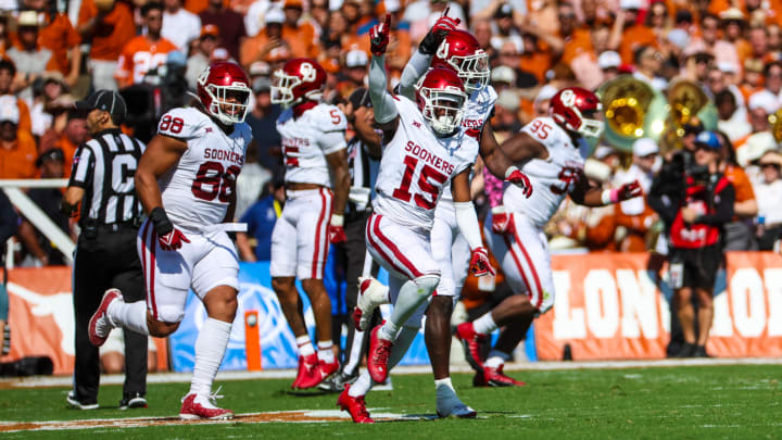 Oct 7, 2023; Dallas, Texas, USA;  Oklahoma Sooners defensive back Kendel Dolby (15) celebrates with teammates after making an interception during the first half against the Texas Longhorns at the Cotton Bowl. Mandatory Credit: Kevin Jairaj-USA TODAY Sports