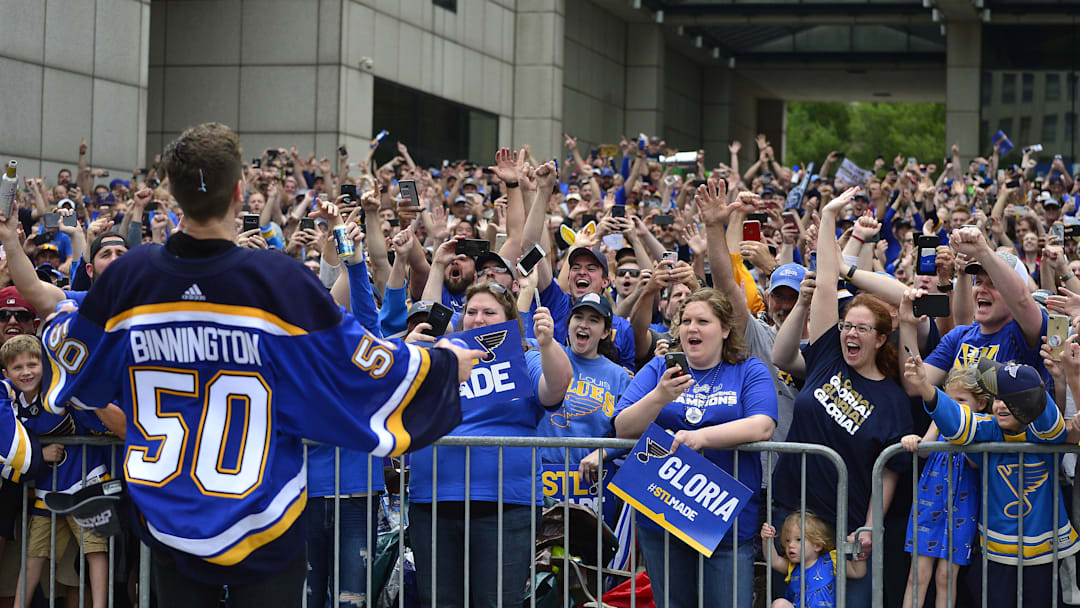 Jun 15, 2019; St. Louis, MO, USA; St. Louis Blues goaltender Jordan Binnington (50) celebrates with fans during the Stanley Cup championship parade and rally at the Gateway Arch. Mandatory Credit: Jeff Curry-Imagn Images