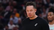 Apr 9, 2025; San Francisco, California, USA; San Antonio Spurs interim head coach Mitch Johnson watches the action against the Golden State Warriors in the second period at Chase Center.