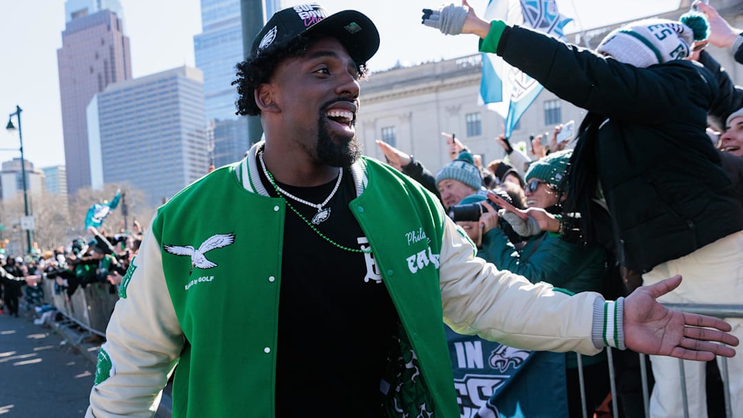Former Philadelphia Eagles defensive tackle Thomas Booker IV (59) celebrates with fans during the Super Bowl LIX championship parade and rally.
