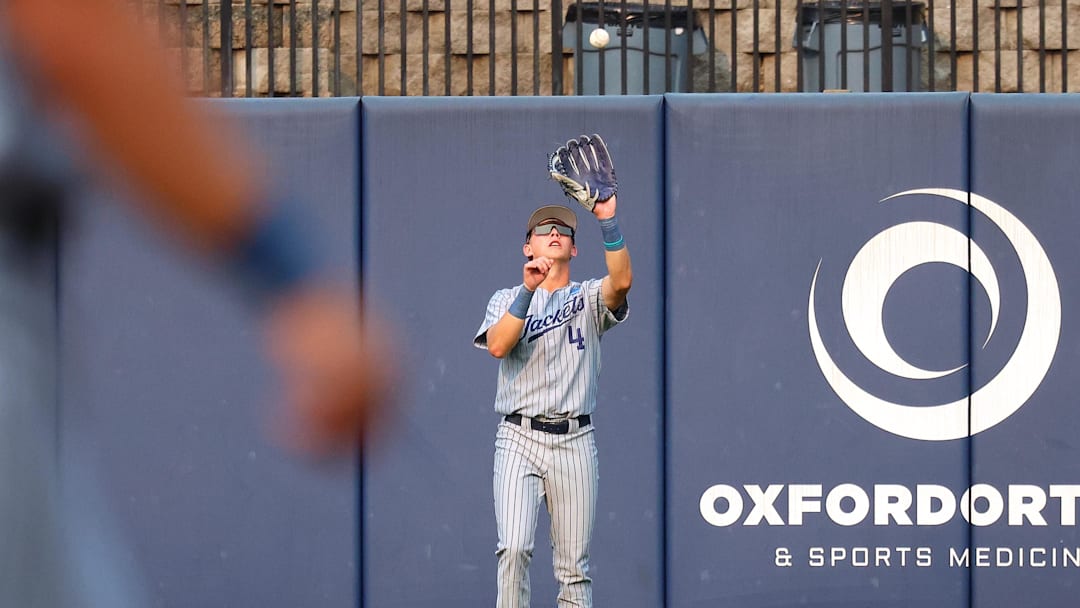 May 31, 2025; Oxford, MS, USA; Georgia Tech Yellowjackets pitcher/infielder Alex Hernandez (4) catches a fly ball during the first inning against the Murray State Racers. Mandatory Credit: Petre Thomas-Imagn Images May 31, 2025; Oxford, MS, USA; Georgia Tech Yellowjackets pitcher/infielder Alex Hernandez (4) catches a fly ball during the first inning against the Murray State Racers. Mandatory Credit: Petre Thomas-Imagn Images