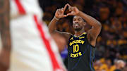 May 2, 2025; San Francisco, California, USA; Golden State Warriors forward Jimmy Butler III (10) calls a play against the Houston Rockets in the third quarter of game six of the first round for the 2025 NBA Playoffs at Chase Center. Mandatory Credit: Cary Edmondson-Imagn Images