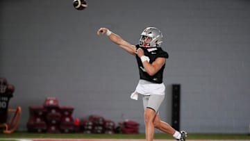Ohio State Buckeyes quarterback Lincoln Kienholz (3) throws during spring football practice at the Woody Hayes Athletic Center in Columbus on March 19, 2025.