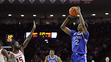 Feb 26, 2025; Norman, Oklahoma, USA; Kentucky Wildcats guard Jaxson Robinson (2) shoots a three point basket as Oklahoma Sooners guard Duke Miles (15) defend during the first half at Lloyd Noble Center. Mandatory Credit: Alonzo Adams-Imagn Images