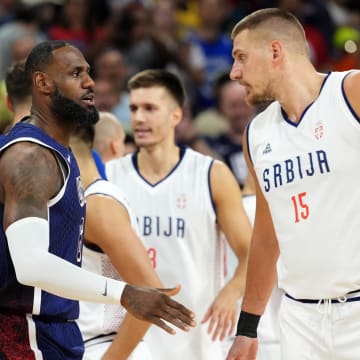 Jul 28, 2024; Villeneuve-d'Ascq, France; United States forward LeBron James (6) and Serbia power forward Nikola Jokic (15) before a game against Serbia during the Paris 2024 Olympic Summer Games at Stade Pierre-Mauroy. 