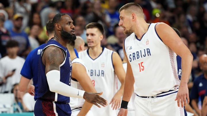 Jul 28, 2024; Villeneuve-d'Ascq, France; United States forward LeBron James (6) and Serbia power forward Nikola Jokic (15) before a game against Serbia during the Paris 2024 Olympic Summer Games at Stade Pierre-Mauroy. 