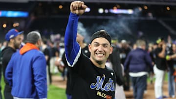 Oct 9, 2024; New York, New York, USA; New York Mets second baseman Jose Iglesias (11) celebrates after defeating the Philadelphia Phillies in game four of the NLDS for the 2024 MLB Playoffs at Citi Field. 