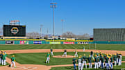 Feb 16, 2024; Mesa, AZ, USA; Oakland Athletics players run drills during a Spring Training workout at Hohokum stadium. 