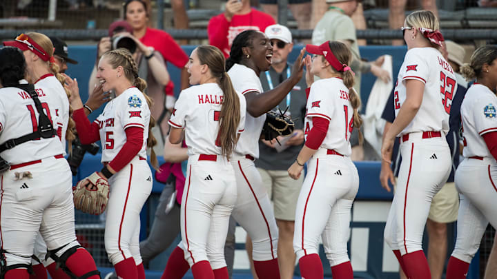 May 31, 2025; Oklahoma City, OK, USA; Texas Tech Red Raiders pitcher NiJaree Canady (24) celebrates with her teammates after defeating the UCLA Bruins 3-1 during the NCAA Softball Women's College World Series at Devon Park. Mandatory Credit: Brett Rojo-Imagn Images