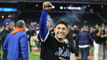 Oct 9, 2024; New York, New York, USA; New York Mets second baseman Jose Iglesias (11) celebrates after defeating the Philadelphia Phillies in game four of the NLDS for the 2024 MLB Playoffs at Citi Field. Mandatory Credit: Wendell Cruz-Imagn Images