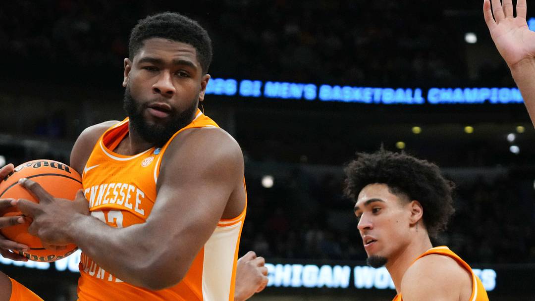 Mar 29, 2026; Chicago, IL, USA; Tennessee Volunteers forward Jaylen Carey (23) grabs a rebound in the first half against the Michigan Wolverines during an Elite Eight game of the Midwest Regional of the men's 2026 NCAA Tournament at United Center. 