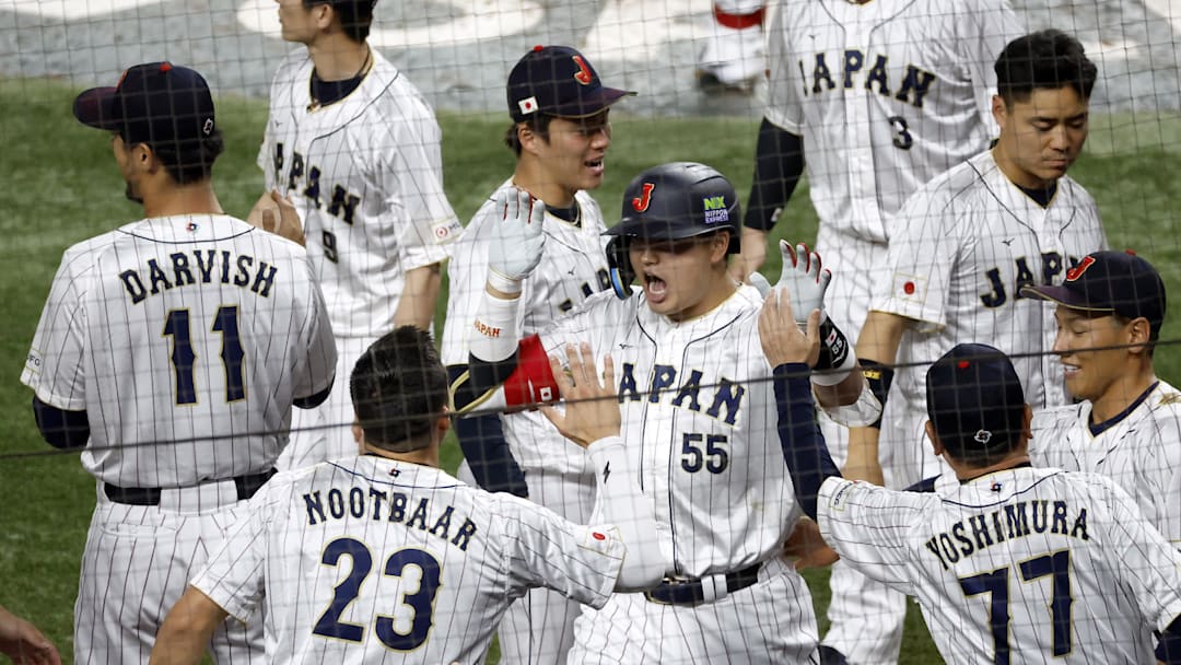 Mar 21, 2023; Miami, Florida, USA; Japan third baseman Munetaka Murakami (55) celebrates home run against the USA in the second inning at LoanDepot Park. Mandatory Credit: Rhona Wise-Imagn Images