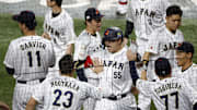 Mar 21, 2023; Miami, Florida, USA; Japan third baseman Munetaka Murakami (55) celebrates home run against the USA in the second inning at LoanDepot Park. Mandatory Credit: Rhona Wise-Imagn Images