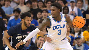 Feb 8, 2025; Los Angeles, California, USA; Penn State Nittany Lions forward Zach Hicks (24) guard UCLA Bruins guard Eric Dailey Jr. (3) in the first half at Pauley Pavilion presented by Wescom. Mandatory Credit: Jayne Kamin-Oncea-Imagn Images