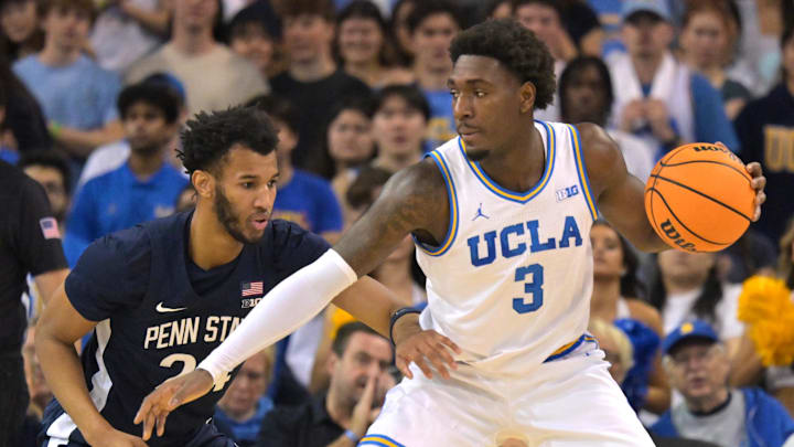 Feb 8, 2025; Los Angeles, California, USA; Penn State Nittany Lions forward Zach Hicks (24) guard UCLA Bruins guard Eric Dailey Jr. (3) in the first half at Pauley Pavilion presented by Wescom. Mandatory Credit: Jayne Kamin-Oncea-Imagn Images