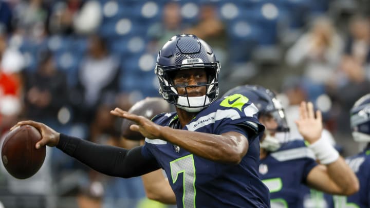 Aug 24, 2024; Seattle, Washington, USA; Seattle Seahawks quarterback Geno Smith (7) passes during pregame warmups against the Cleveland Browns at Lumen Field. Mandatory Credit: Joe Nicholson-USA TODAY Sports