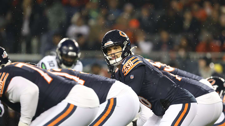 Caleb Williams is at the line of scrimmage awaiting the snap but it seems his options are limited with changing play calls. Caleb Williams is at the line of scrimmage awaiting the snap but it seems his options are limited with changing play calls.