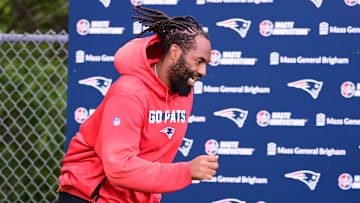 Jun 12, 2024; Foxborough, MA, USA;  New England Patriots linebacker Matthew Judon (9) runs onto the practice field at minicamp at Gillette Stadium. 