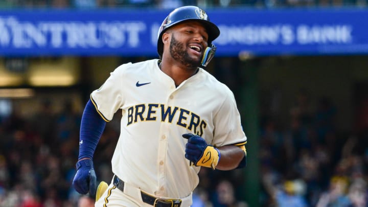 Sep 2, 2024; Milwaukee, Wisconsin, USA; Milwaukee Brewers left fielder Jackson Chourio (11) reacts after hitting a grand slam home run in the sixth inning against the St. Louis Cardinals at American Family Field. Mandatory Credit: Benny Sieu-USA TODAY Sports