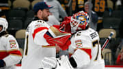 Florida Panthers goaltenders Anthony Stolarz and Sergei Bobrovsky celebrate after defeating the Pittsburgh Penguins.