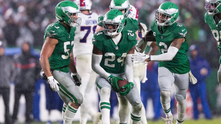 Nov 26, 2023; Philadelphia, Pennsylvania, USA; Philadelphia Eagles cornerback James Bradberry (24) celebrates with cornerback Darius Slay (2) and linebacker Christian Elliss (53) after his interception against the Buffalo Bills during the third quarter at Lincoln Financial Field. M