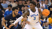 Feb 8, 2025; Los Angeles, California, USA; Penn State Nittany Lions forward Zach Hicks (24) guard UCLA Bruins guard Eric Dailey Jr. (3) in the first half at Pauley Pavilion presented by Wescom. Mandatory Credit: Jayne Kamin-Oncea-Imagn Images