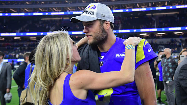 Los Angeles Rams quarterback Matthew Stafford (9) with wife Kelly Hall after defeating the San Francisco 49ers in the NFC Championship Game in 2022. Los Angeles Rams quarterback Matthew Stafford (9) with wife Kelly Hall after defeating the San Francisco 49ers in the NFC Championship Game in 2022.