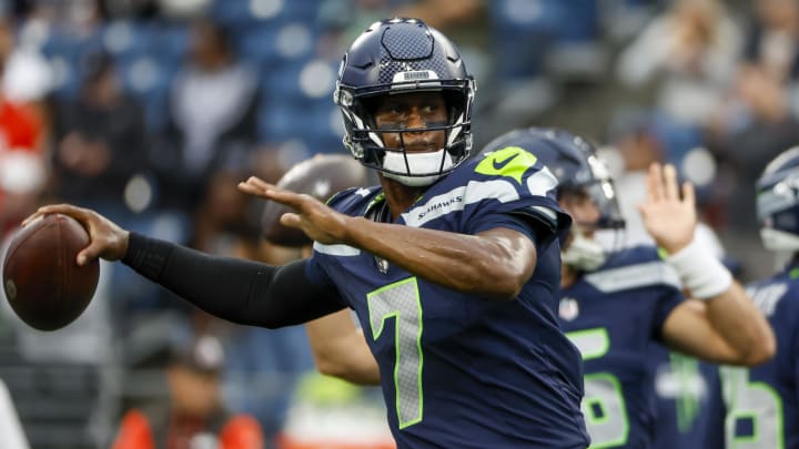 Aug 24, 2024; Seattle, Washington, USA; Seattle Seahawks quarterback Geno Smith (7) passes during pregame warmups against the Cleveland Browns at Lumen Field. Mandatory Credit: Joe Nicholson-USA TODAY Sports