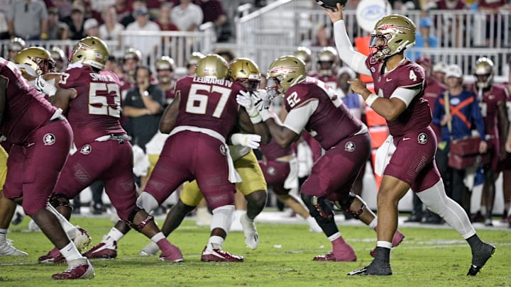 Sep 2, 2024; Tallahassee, Florida, USA; Florida State Seminoles quarterback DJ Uiagalelei (4) throws the ball during the first half against the Boston College Eagles at Doak S. Campbell Stadium. Mandatory Credit: Melina Myers-Imagn Images