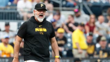 Jun 6, 2024; Pittsburgh, Pennsylvania, USA;  Pittsburgh Pirates manager Derek Shelton (17) protests a reviewed call against the Los Angeles Dodgers during the first inning at PNC Park. Mandatory Credit: Charles LeClaire-USA TODAY Sports