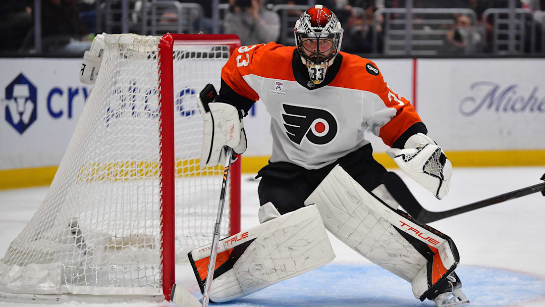 Mar 19, 2026; Los Angeles, California, USA; Philadelphia Flyers goaltender Samuel Ersson (33) defends the goal against the Los Angeles Kings during the second period at Crypto.com Arena.
