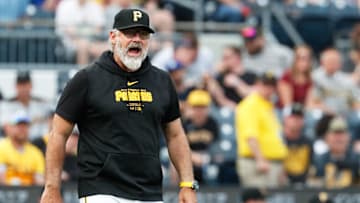 Jun 6, 2024; Pittsburgh, Pennsylvania, USA;  Pittsburgh Pirates manager Derek Shelton (17) protests a reviewed call against the Los Angeles Dodgers during the first inning at PNC Park. Mandatory Credit: Charles LeClaire-Imagn Images