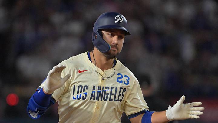 Sep 20, 2025; Los Angeles, California, USA; Los Angeles Dodgers outfielder Michael Conforto (23) reacts after scoring a run during the third inning against the San Francisco Giants at Dodger Stadium. Mandatory Credit: Jayne Kamin-Oncea-Imagn Images