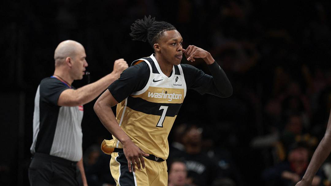 Apr 5, 2026; Brooklyn, New York, USA; Washington Wizards guard Bub Carrington (7) reacts after making a three point basket during the second half against the Brooklyn Nets at Barclays Center. Mandatory Credit: Vincent Carchietta-Imagn Images