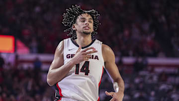 Jan 18, 2025; Athens, Georgia, USA; Georgia Bulldogs forward Asa Newell (14) reacts after making a three point shot against the Auburn Tigers at Stegeman Coliseum. Mandatory Credit: Dale Zanine-Imagn Images