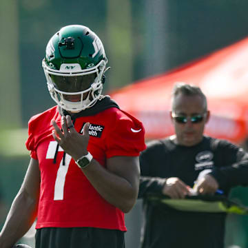 Jul 25, 2025; Florham Park, NJ, USA; New York Jets quarterback Justin Fields (7) looks on during a drill during training camp at Atlantic Health Jets Training Center. Mandatory Credit: John Jones-Imagn Images