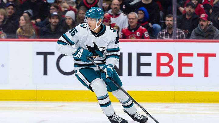 Mar 1, 2025; Ottawa, Ontario, CAN; San Jose Sharks defenseman Shakir Mukhamadullin (85) skates with the puck in the first period against the Ottawa Senators at the Canadian Tire Centre. Mandatory Credit: Marc DesRosiers-Imagn Images