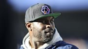 Feb 24, 2019; Atlanta, GA, USA; Former Atlanta Falcons quarterback Michael Vick (7) watches a game between the Atlanta Legends and Birmingham Iron in the first half at Georgia State Stadium. Mandatory Credit: Brett Davis-Imagn Images