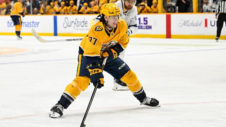 Dec 20, 2025; Nashville, Tennessee, USA; Nashville Predators right wing Luke Evangelista (77) takes a shot on goal against the Toronto Maple Leafs during the third period at Bridgestone Arena. Mandatory Credit: Steve Roberts-Imagn Images Dec 20, 2025; Nashville, Tennessee, USA; Nashville Predators right wing Luke Evangelista (77) takes a shot on goal against the Toronto Maple Leafs during the third period at Bridgestone Arena. Mandatory Credit: Steve Roberts-Imagn Images