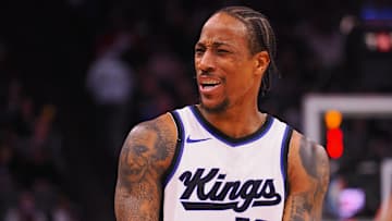 Mar 19, 2025; Sacramento, California, USA; Sacramento Kings forward/guard DeMar DeRozan (10) speaks to Cleveland Cavaliers head coach Kenny Atkinson (not pictured) during the second quarter at Golden 1 Center. Mandatory Credit: Kelley L Cox-Imagn Images