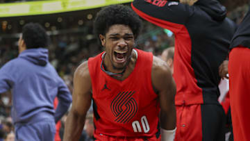 Dec 2, 2023; Salt Lake City, Utah, USA; Portland Trail Blazers guard Scoot Henderson (00) reacts to a play against the Utah Jazz during the second half at Delta Center. Mandatory Credit: Rob Gray-Imagn Images