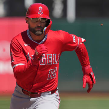 Jul 21, 2024; Oakland, California, USA; Los Angeles Angels center fielder Kevin Pillar (12) runs to third base during the eighth inning against the Oakland Athletics at Oakland-Alameda County Coliseum.