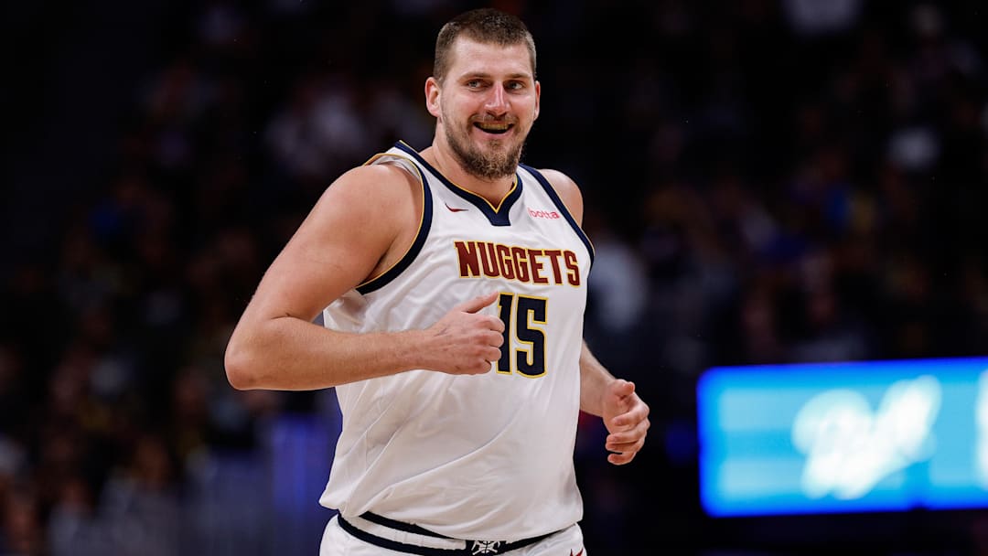 Oct 13, 2024; Denver, Colorado, USA; Denver Nuggets center Nikola Jokic (15) reacts after a play in the second quarter against the Phoenix Suns at Ball Arena. Mandatory Credit: Isaiah J. Downing-Imagn Images