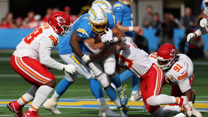 Jan 7, 2024; Inglewood, California, USA; Los Angeles Chargers running back Austin Ekeler (30) runs with the ball during the first quarter against the Kansas City Chiefs at SoFi Stadium. Mandatory Credit: Kiyoshi Mio-USA TODAY Sports